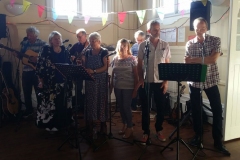 Tuning up at David's birthday party. All together now - mmm